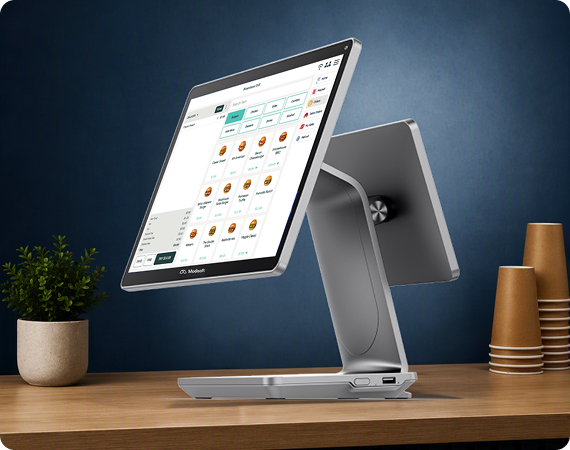 Modisoft M26 Counter Station displaying a touchscreen point of sale interface on a countertop.